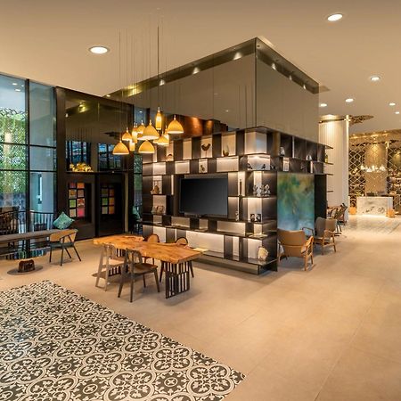 Hyatt Centric Candolim Goa Exterior foto The lobby of the hotel