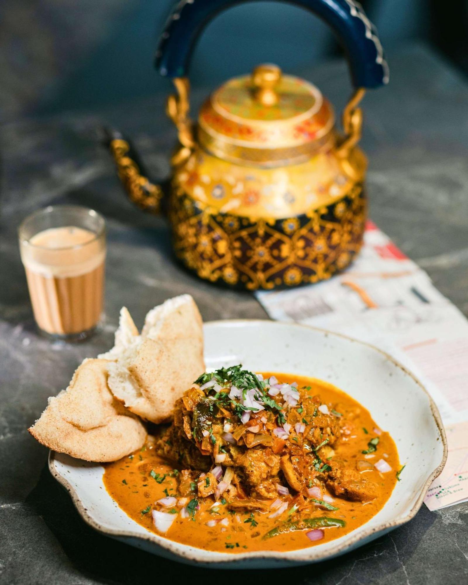 Hyatt Centric Candolim Goa Exterior foto A plate of chicken masala