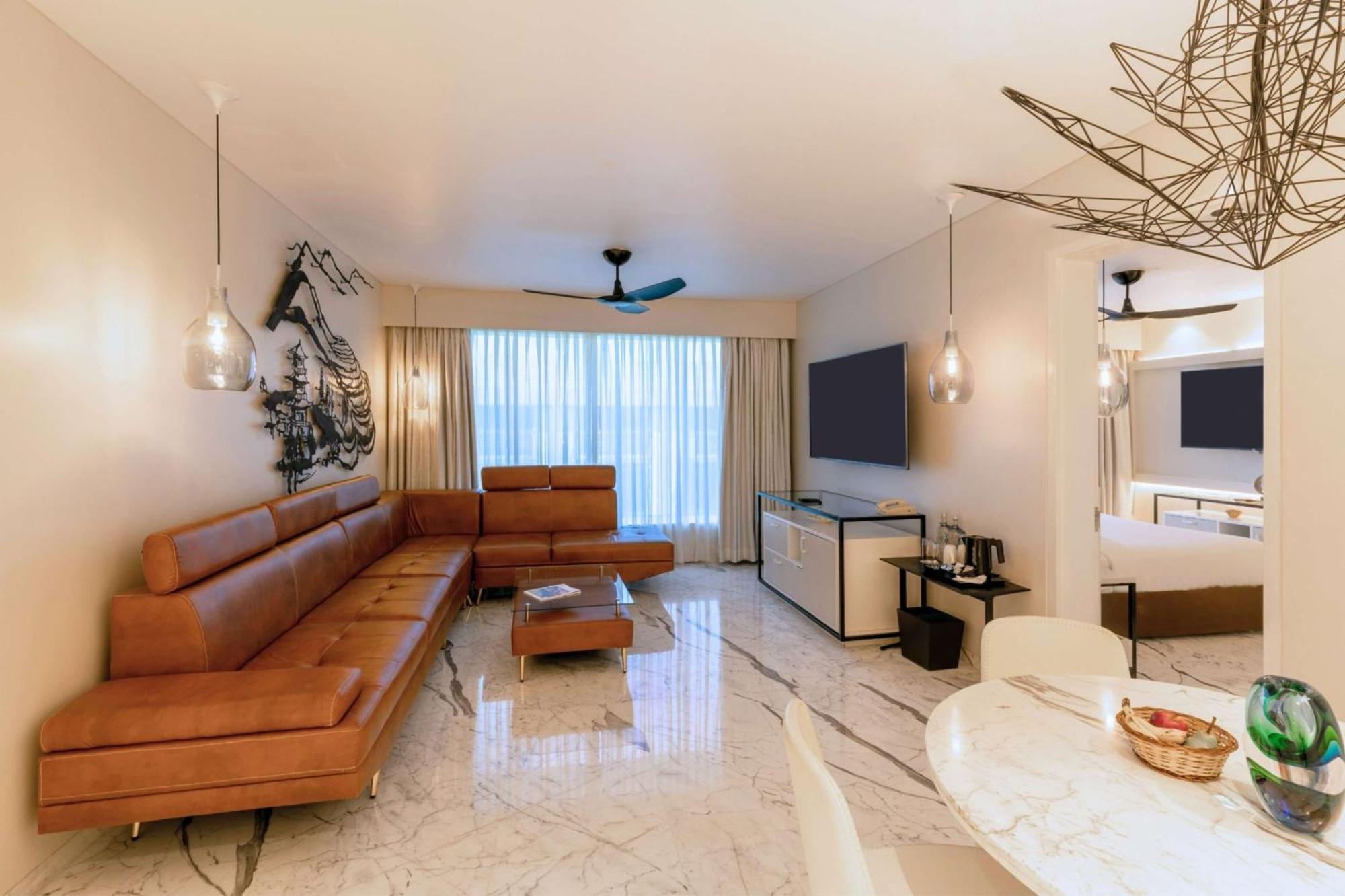 Hyatt Centric Candolim Goa Exterior foto A living room in a condominium