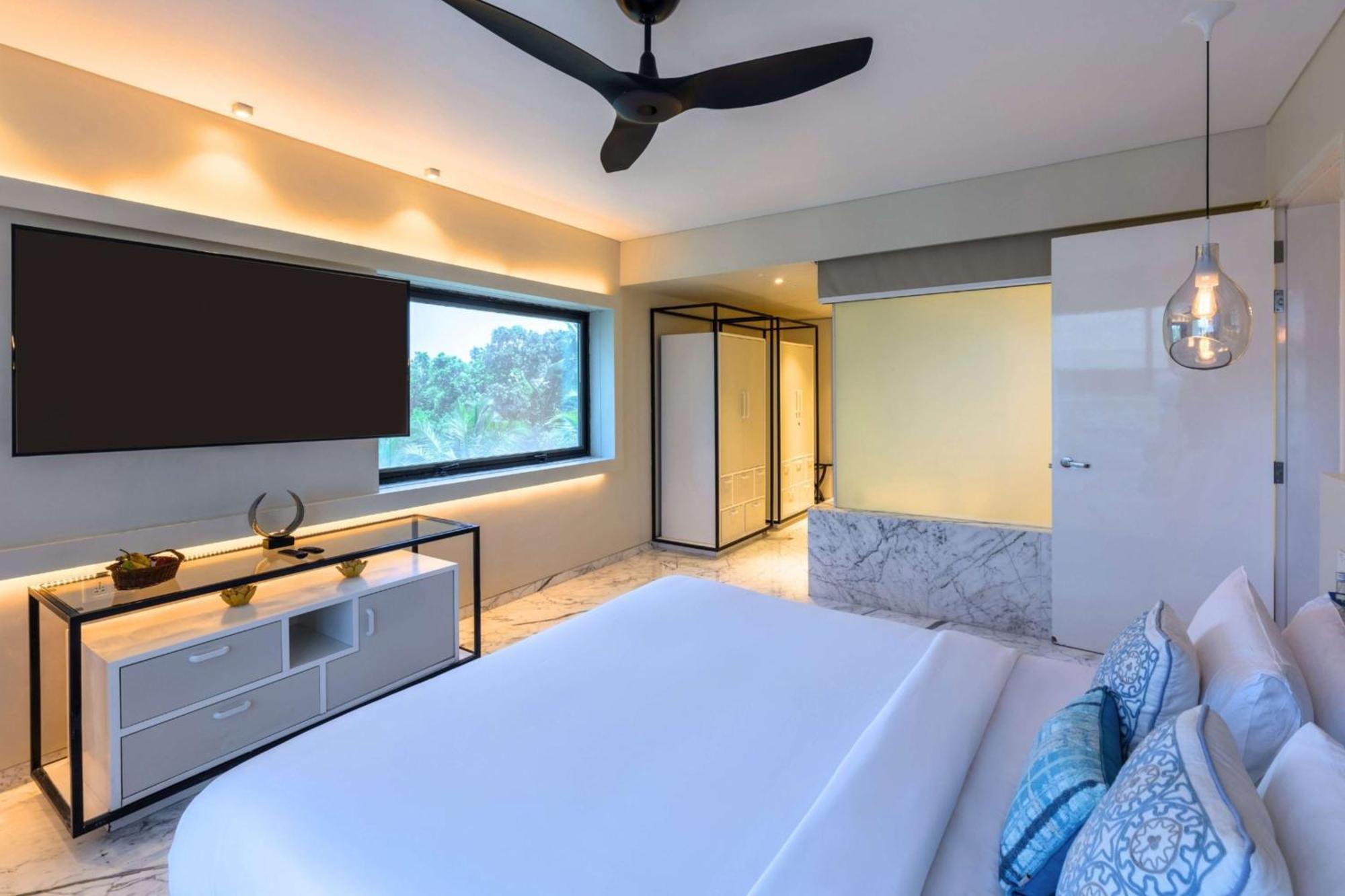 Hyatt Centric Candolim Goa Exterior foto A modern bedroom